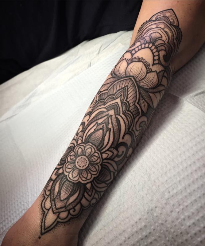 Decorative lotus forearm tattoo by Laura Jade: TattooNOW