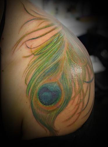 peacock feather tattoo by Kimberly Bearden: TattooNOW