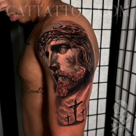 Calvin F. Xavier III - Jesus Arm Tattoo